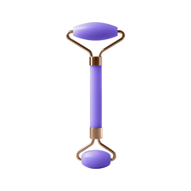 Purple facial roller with gold accents on a white background